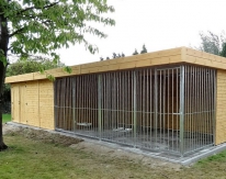 Jaro - Houten hondenrennen + tuinhuis 9x3m